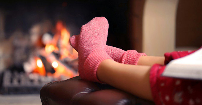 Warming up by the fireplace