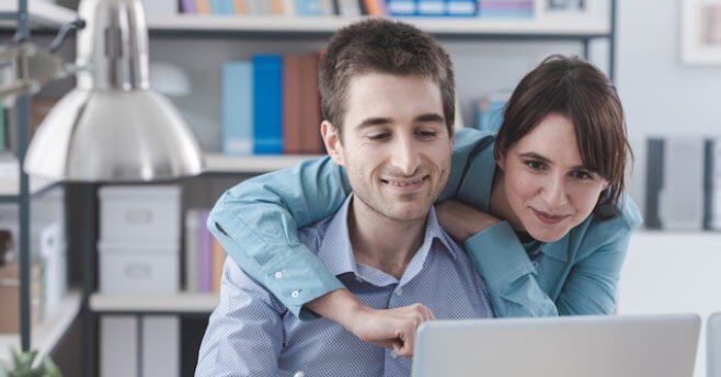 Young Couple shopping for insurance online